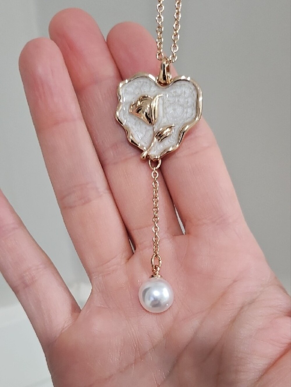 Avon rose gold heart lariat necklace with pearl drop